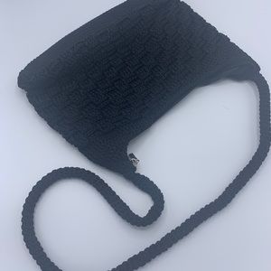 Black woven zip closure purse
